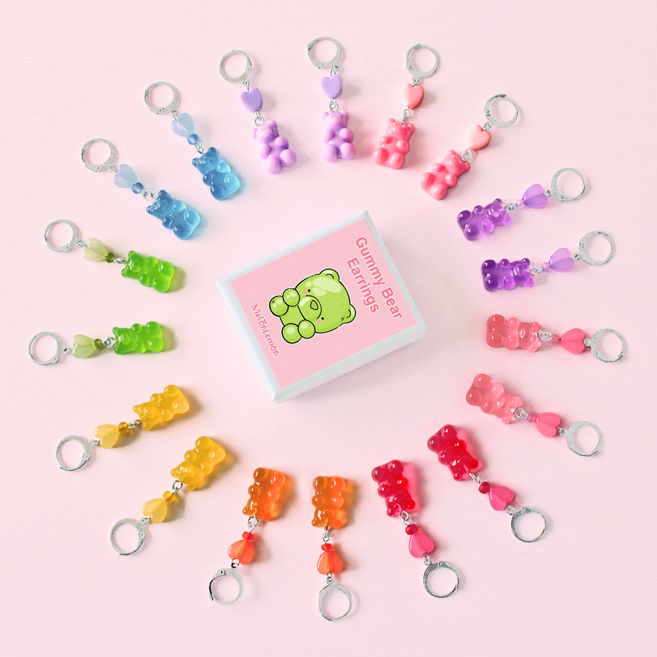 Various sets of hand made stainless steel earrings with colored resin gummy bears