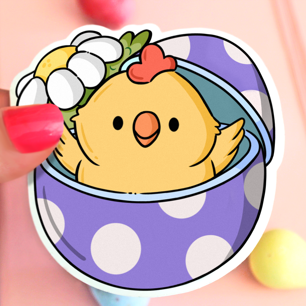 Hand drawn vinyl sticker of a kawaii chicken in a purple egg with polka dots and a daisy