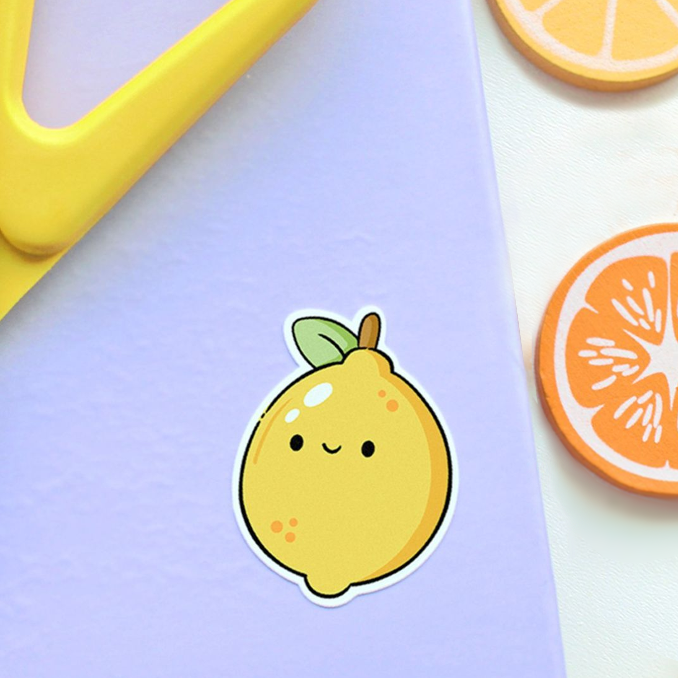 Hand drawn stickers sheet with fruit items on a turquoise blue background. Lemon, apple, persimmon, pear, strawberry, banana, grape, cherry.