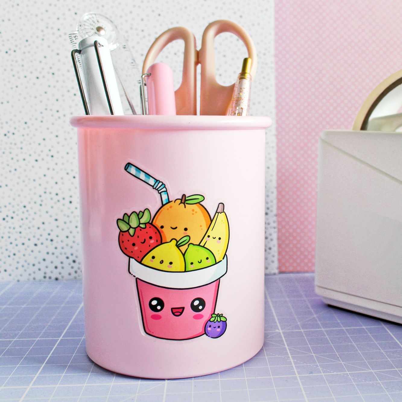 Hand drawn vinyl sticker of a cup with fruit