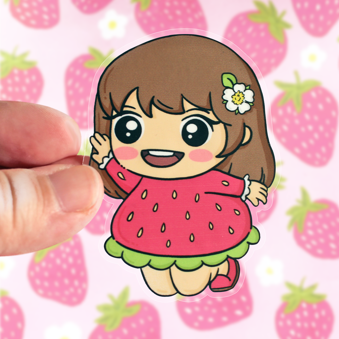 Hand drawn vinyl sticker of a kawaii girl in a strawberry dress