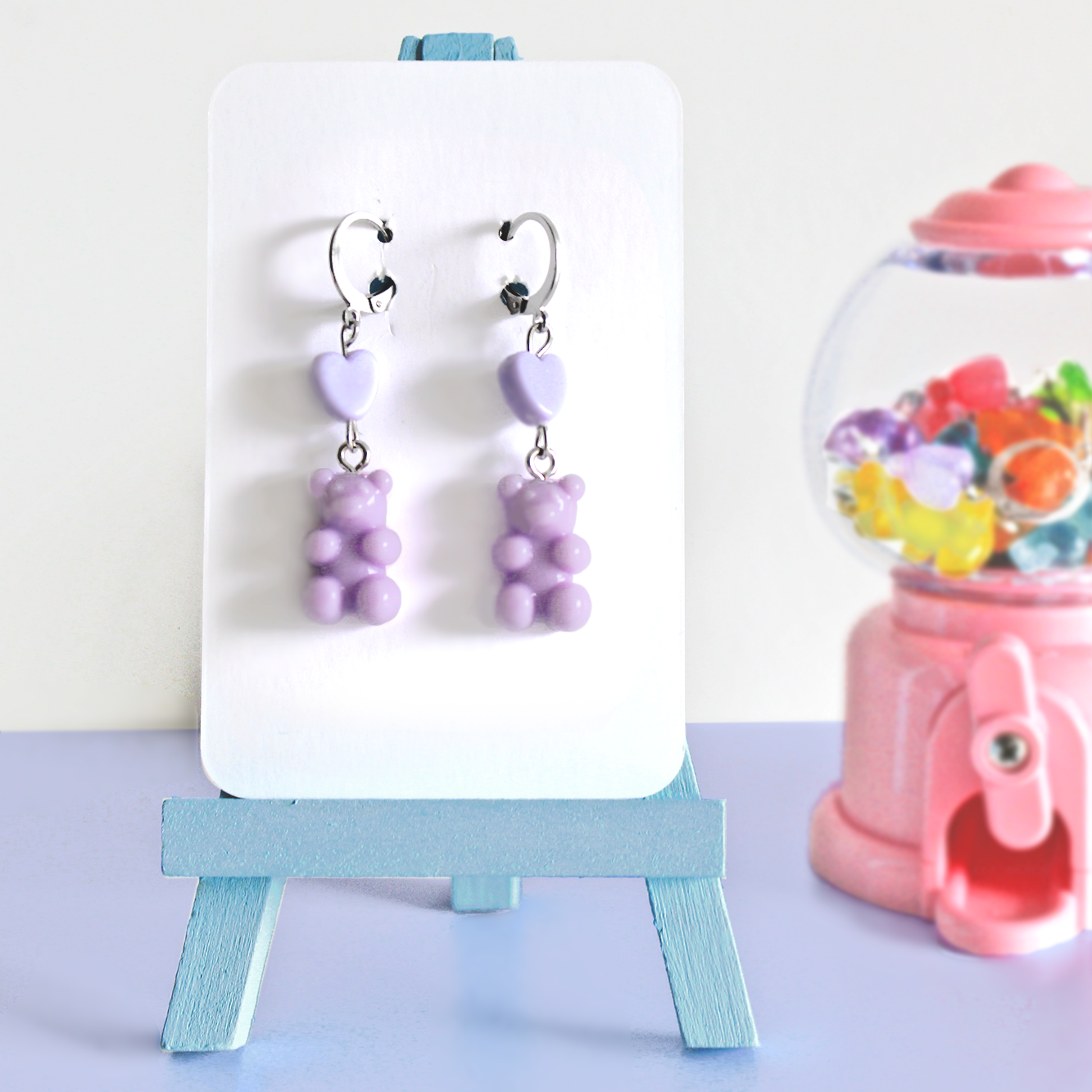 Pair of hand made stainless steel earrings with colored resin gummy bears