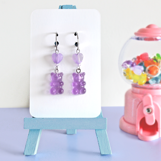 Pair of hand made stainless steel earrings with colored resin gummy bears